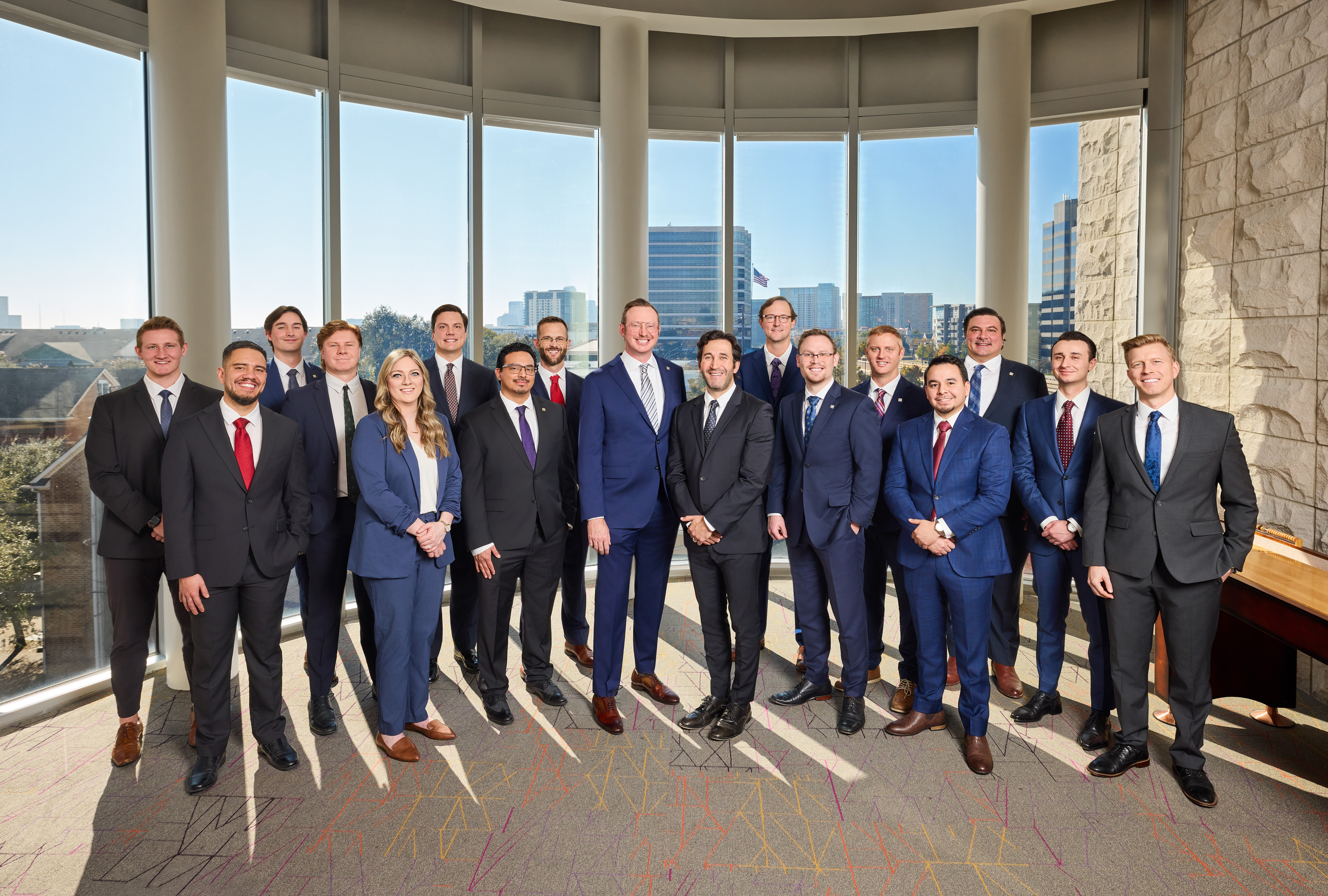 The team photo for The Multifamily Group taken in Dallas, TX at their office location.